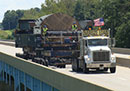 Statewide Restriction Information Statewide Restriction Information: commericial truck crossing a bridge