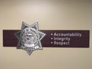 Professional Standards Professional Standards - Wall banner with badge and Accountability, Integrity and Respect listed by it